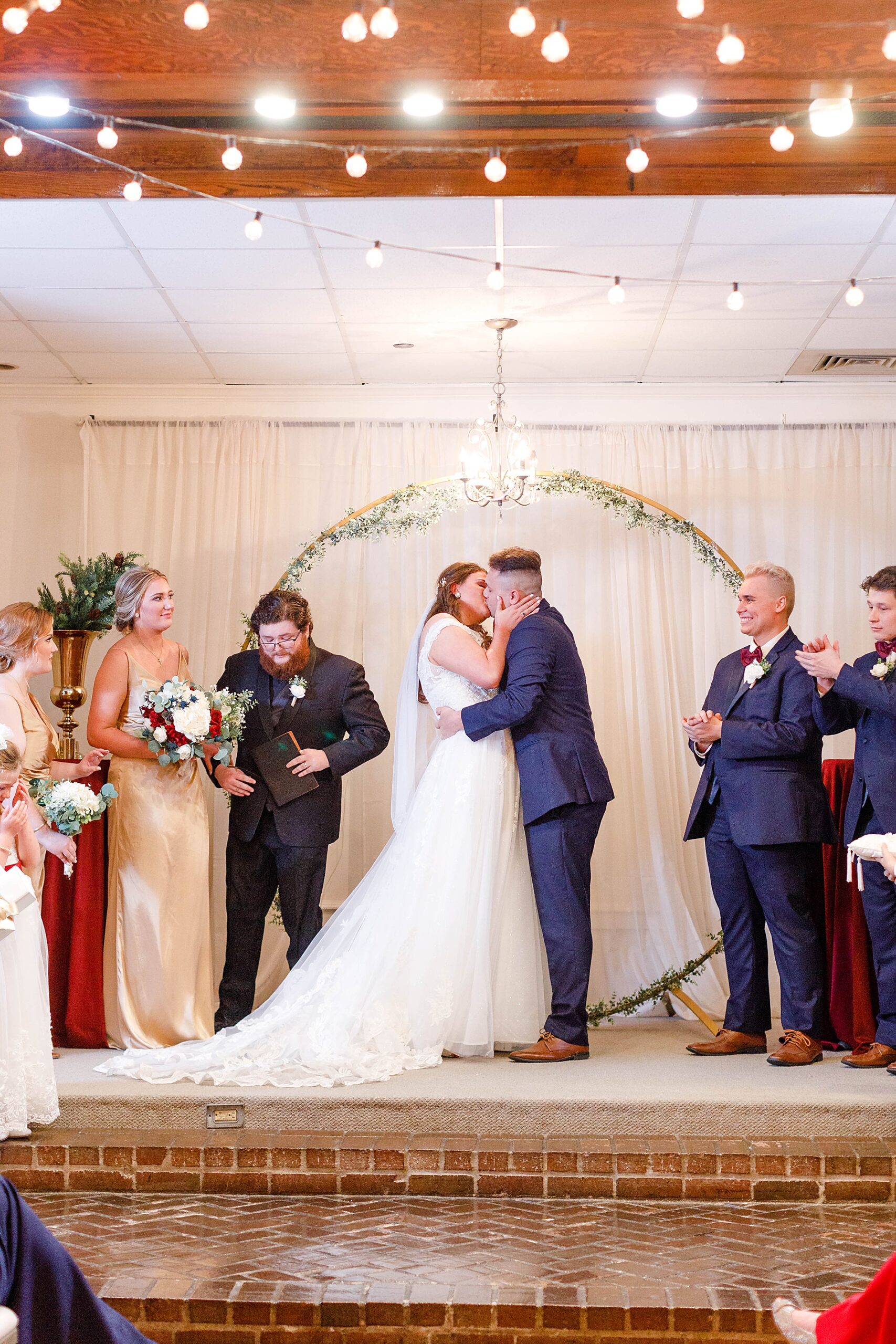 couple kiss during Romantic Oak Lodge Wedding