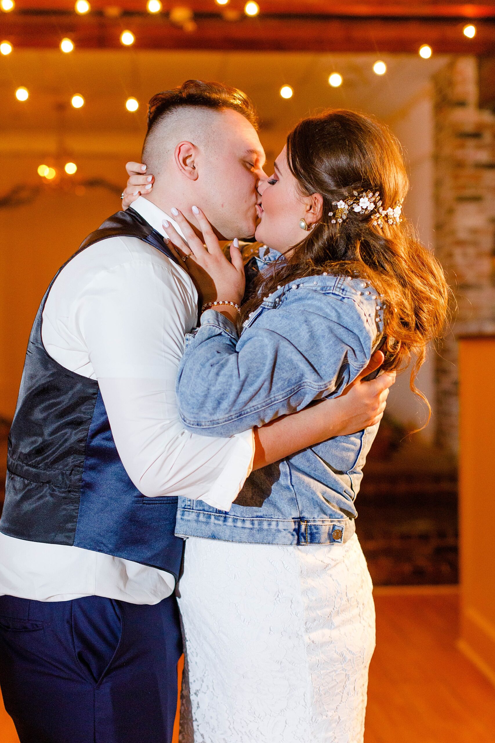 newlyweds kiss after Romantic Oak Lodge Wedding in Baton Rouge