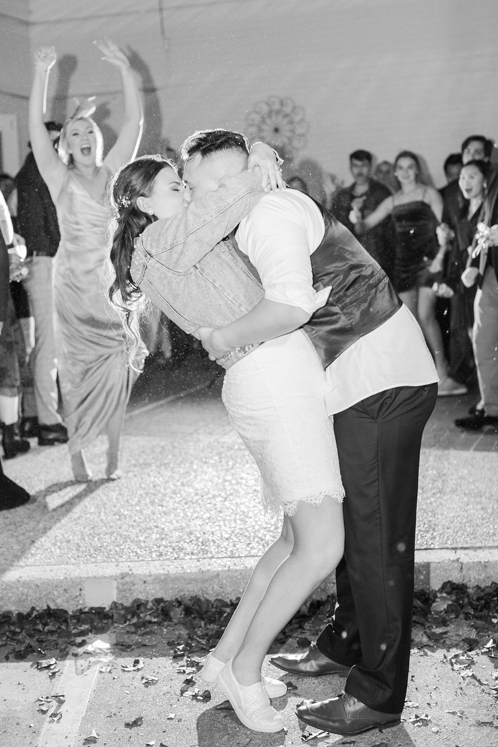 newlyweds kiss at the end of wedding night